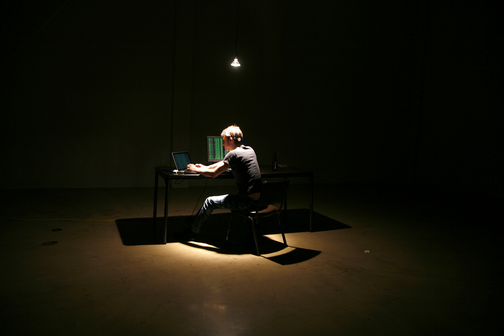The meme depicts a person sitting in a dimly lit room, surrounded by computer screens and cables. The image is captioned "I just spent 10 hours making a 5 second video" and shows the person looking frustrated and exhausted. The meme is a humorous commentary on the often tedious and time-consuming process of creating digital content.